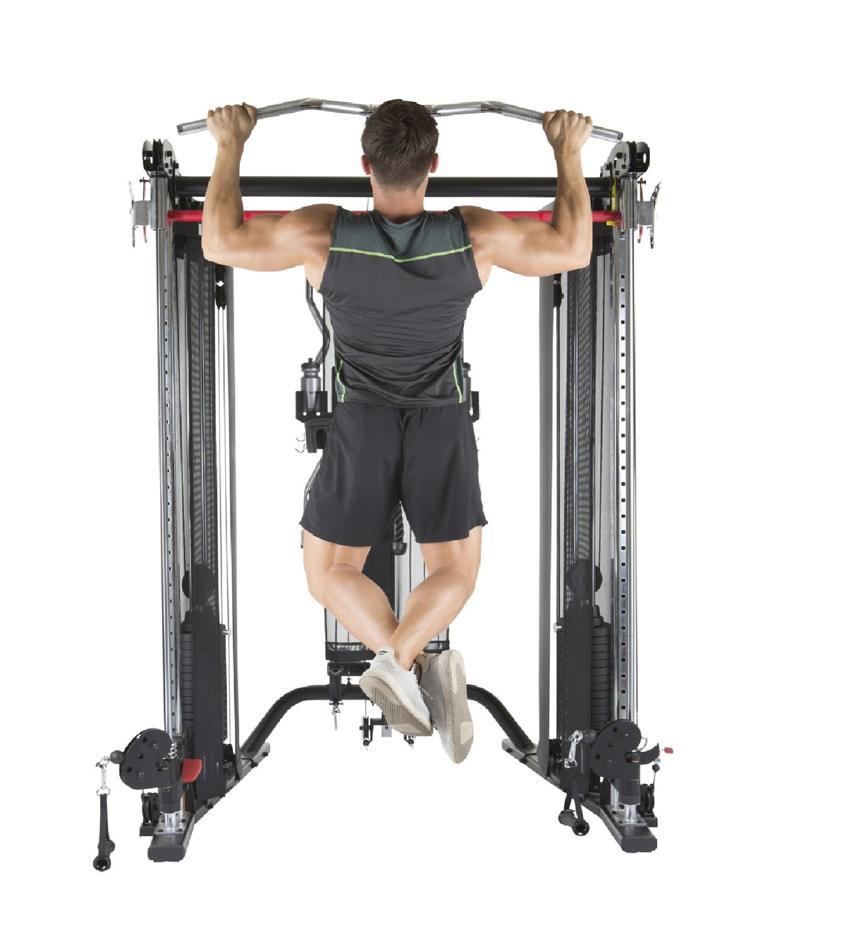 Man doing a pull-up on a strength station