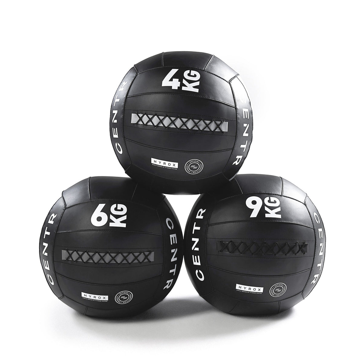 Drie zwarte trainingsballen met de aanduidingen 4 KG, 6 KG en 9 KG.