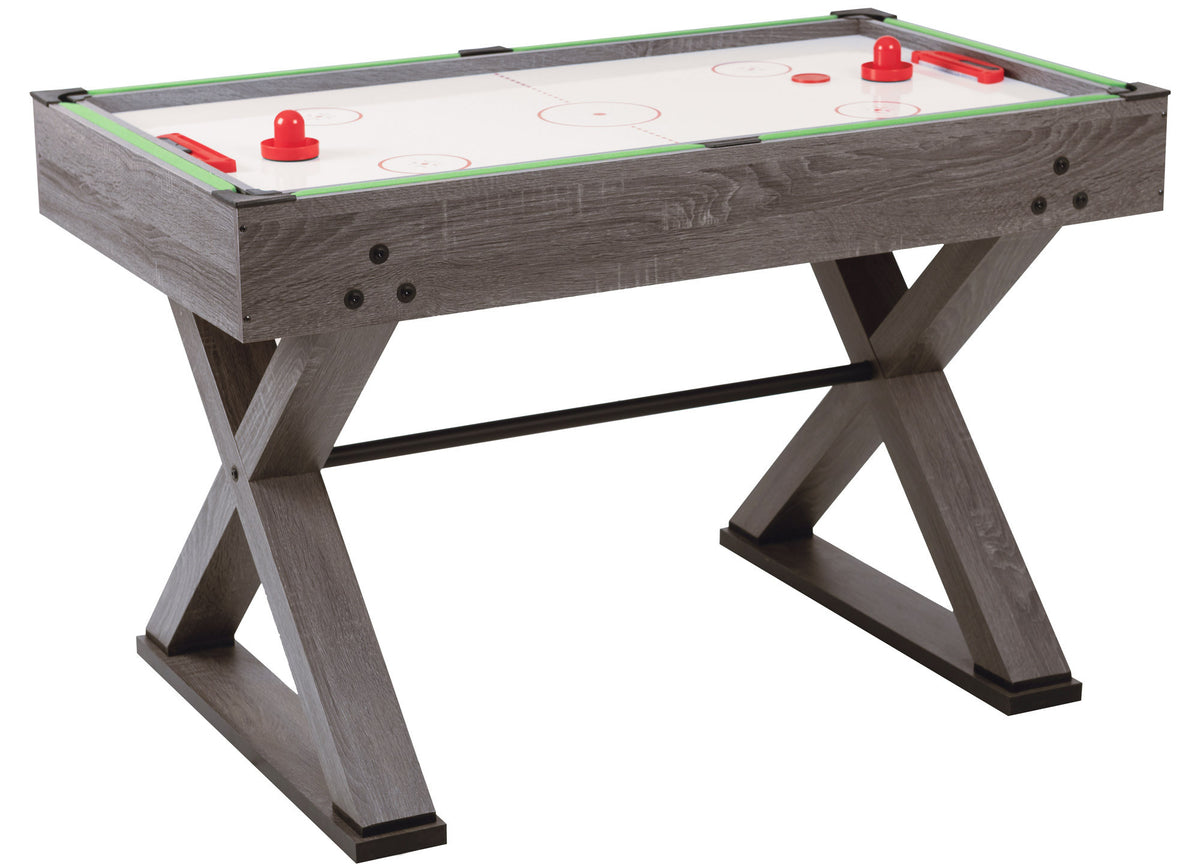 Grijze voetbaltafel met wit airhockeyblad en twee rode pucks of pushers.