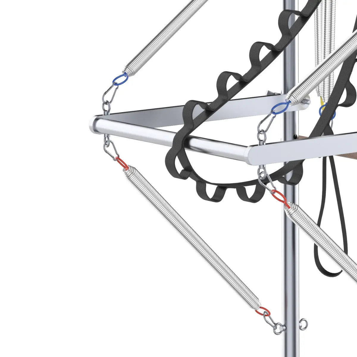 Close-up van metalen veren en zwarte banden die aan het Pilates-torenframe hangen.