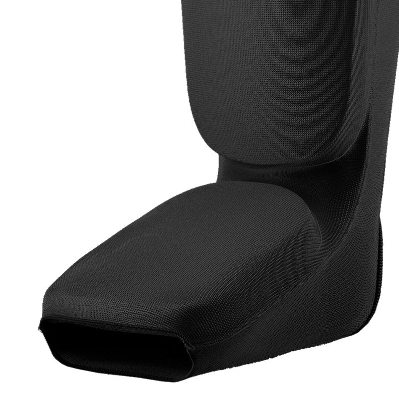 Close-up of the foot section of a black shin and instep guard.