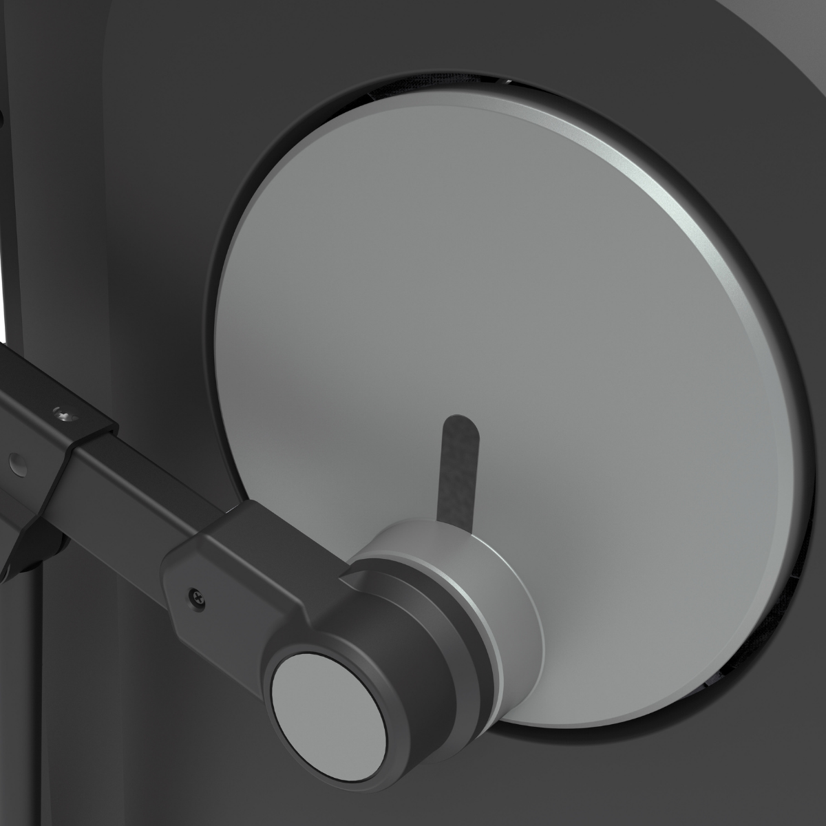Close-up van het ronde vliegwiel en de as van een crosstrainer.